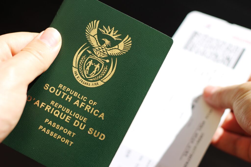 Passport and supporting documents prepared for a Brazilian bank account application, including identification and proof of address requirements.