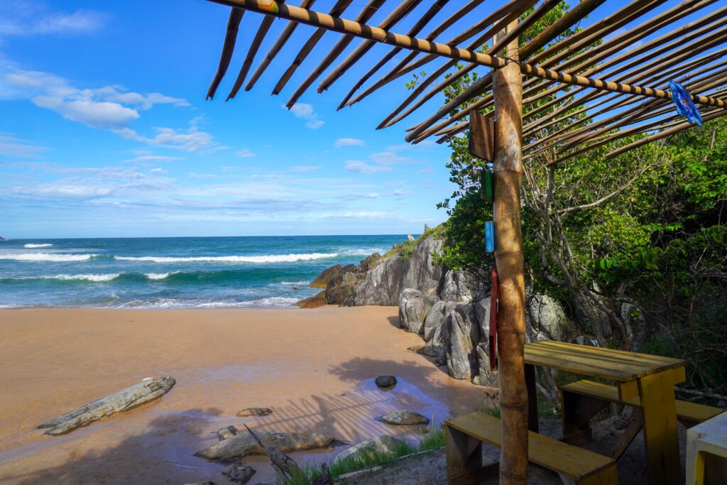 Luxury beachfront setting in Jurerê Internacional, Florianópolis, with ocean views, sandy shoreline, and upscale coastal atmosphere.